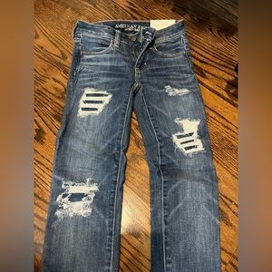 NWT SZ 0 AMERICAN EAGLE SKINNY JEANS DESTROYED